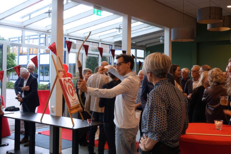 Deelnemers in gesprek tijdens het Frank Lambriks Symposium 2026